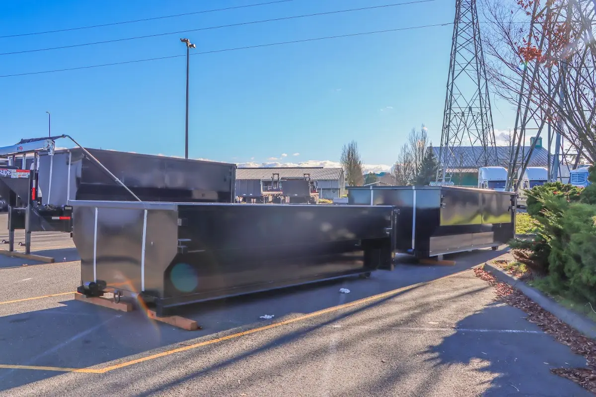 Roll-off dumpster ready for waste disposal at job site for Construction Dumpster Rental in Alondra Park